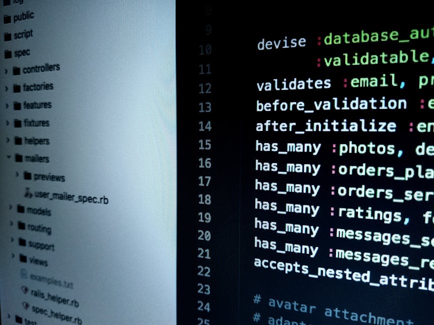 A close-up of a person's hands typing on a sleek, modern laptop with a high-resolution screen displaying lines of code in a dark-themed editor. The scene is set on a smooth, reflective black table, em